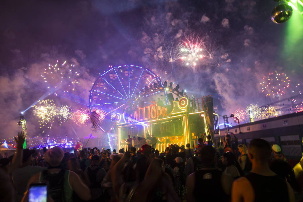 Fireworks go off above the Kalliope art car during the third day of the Electric Daisy Carnival ...