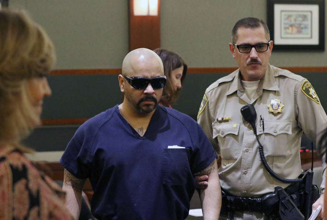 Gustavo Ramos-Martinez, convicted of killing two elderly people in 1998, appears in court durin ...