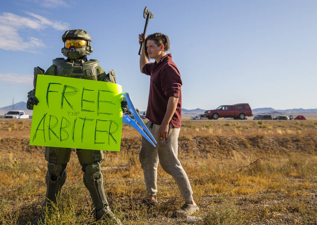 Spencer Smith of Louisiana, right, moves in close to a character from Halo during the Alienstoc ...