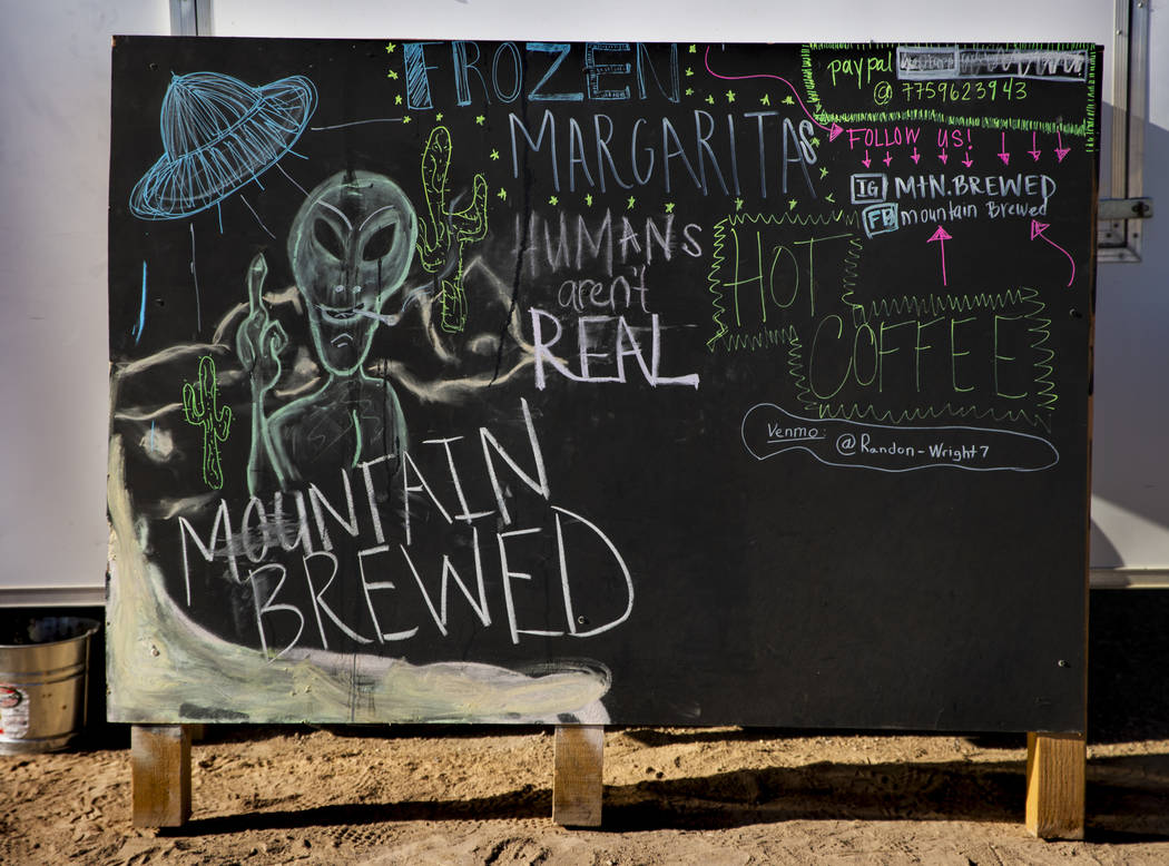 An alien sign for the margarita stand during the Alienstock festival on Saturday, Sept. 21, 201 ...