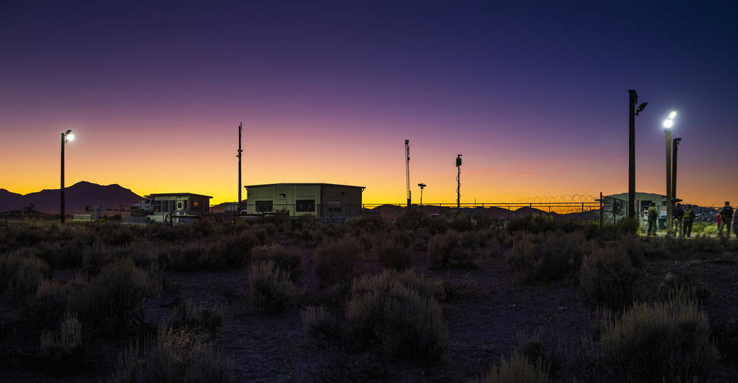 Sunset falls on the back gate of Area 51 during the Alienstock festival on Saturday, Sept. 21, ...