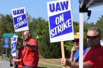 Members of United Auto Workers Local 1590 picket near the GM Martinsburg Parts Distribution Cen ...