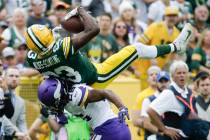 Minnesota Vikings' Trae Waynes breaks up a pass intended for Green Bay Packers' Marquez Valdes- ...