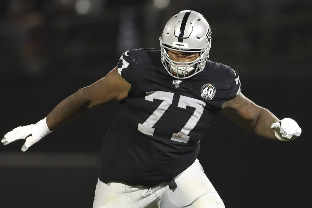 Oakland Raiders offensive tackle Trent Brown (77) protects a gap in the  offensive line during a …