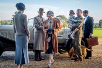 This image released by Focus Features shows Elizabeth McGovern, from left, Harry Hadden-Paton, ...