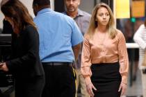 FILE - In this Sept. 13, 2019 file photo, fired Dallas police Officer Amber Guyger, right, arri ...