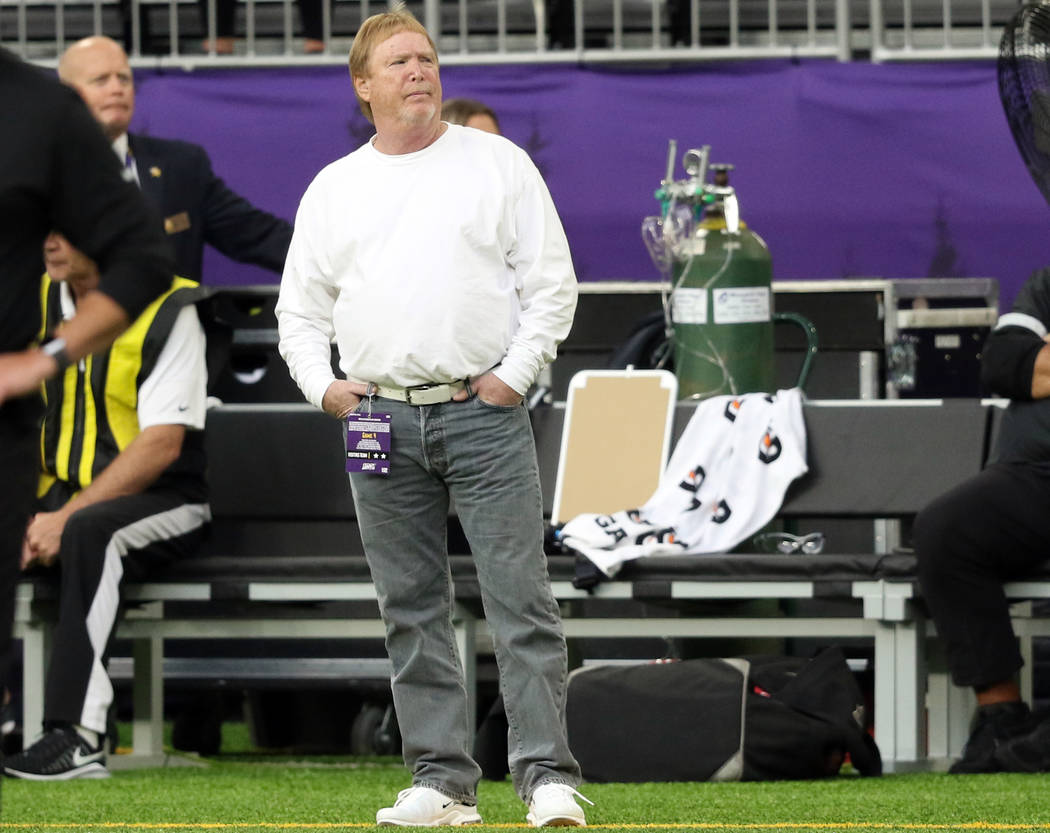 Oakland Raiders owner Mark Davis watches the team warm up ahead of their NFL game against the M ...