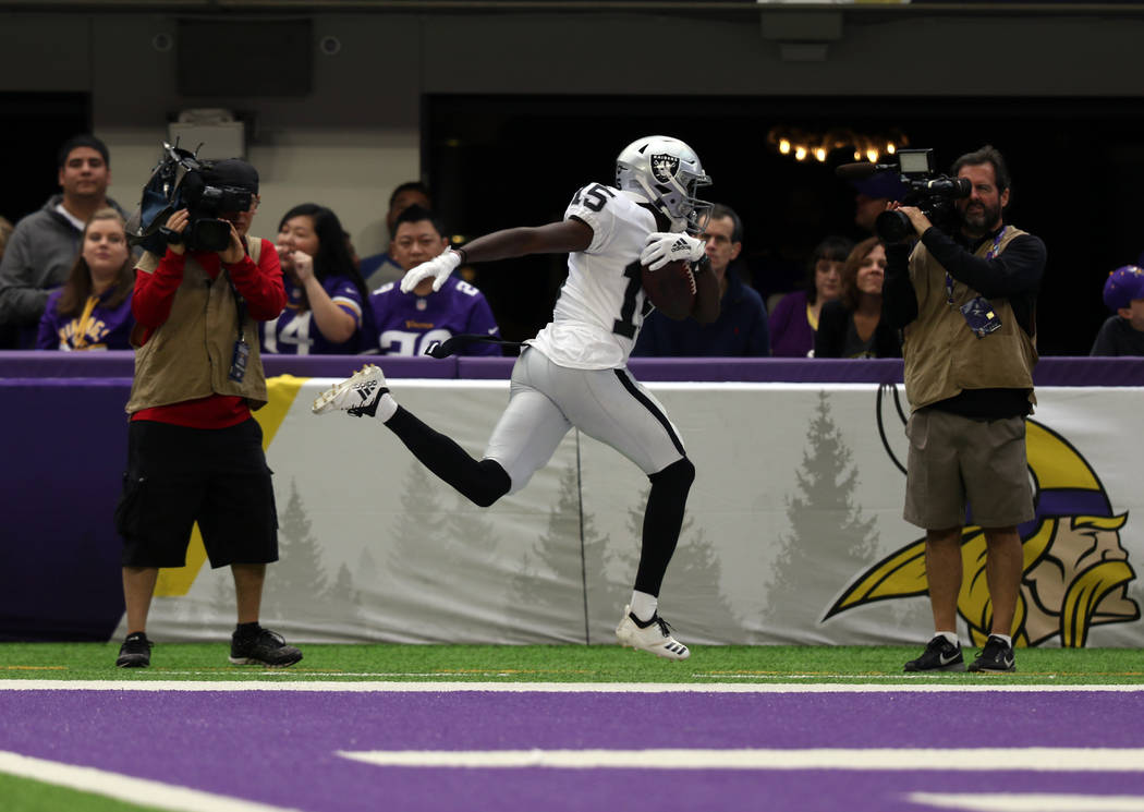 Oakland Raiders wide receiver J.J. Nelson (15) scores a touchdown during the first half on an N ...