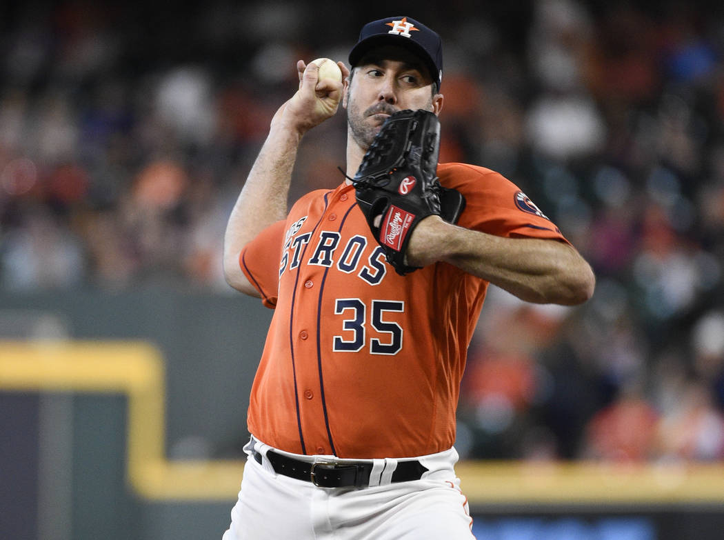 Houston Astros starting pitcher Justin Verlander delivers during the first inning of a baseball ...