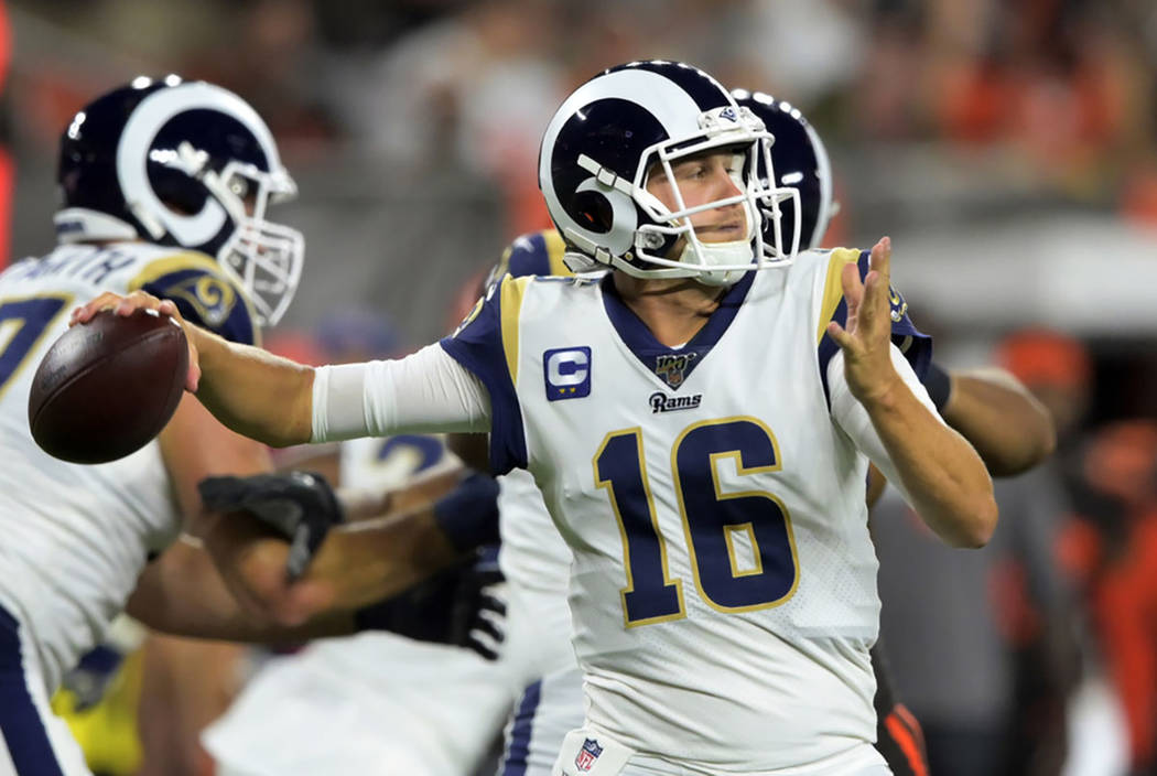 Los Angeles Rams quarterback Jared Goff throws during the first half of an NFL football game ag ...