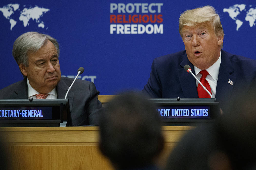 United Nations Secretary General Antonio Guterres listens as President Donald Trump speaks at a ...
