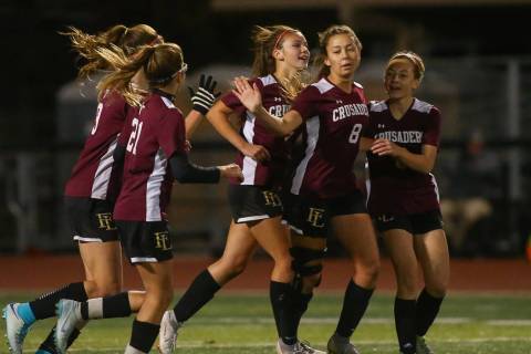 Faith Lutheran celebrates after scoring against Coronado during the state quarterfinal game at ...