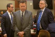 Scott Gragson, center, walks out of court with his attorneys Richard Schonfeld, left, and David ...
