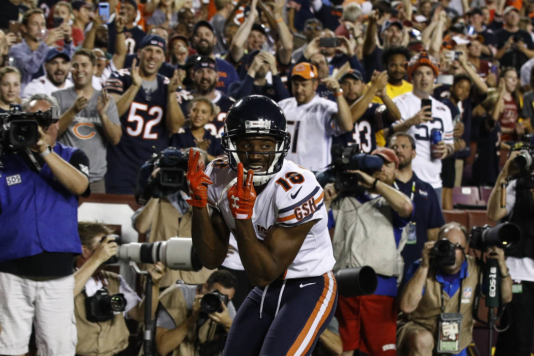 Chicago Bears wide receiver Taylor Gabriel (18) celebrates his touchdown pass during the first ...