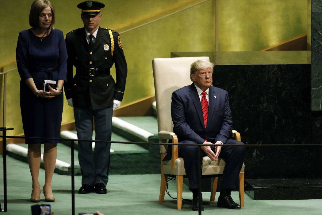 President Donald Trump waits to address the 74th session of the United Nations General Assembly ...