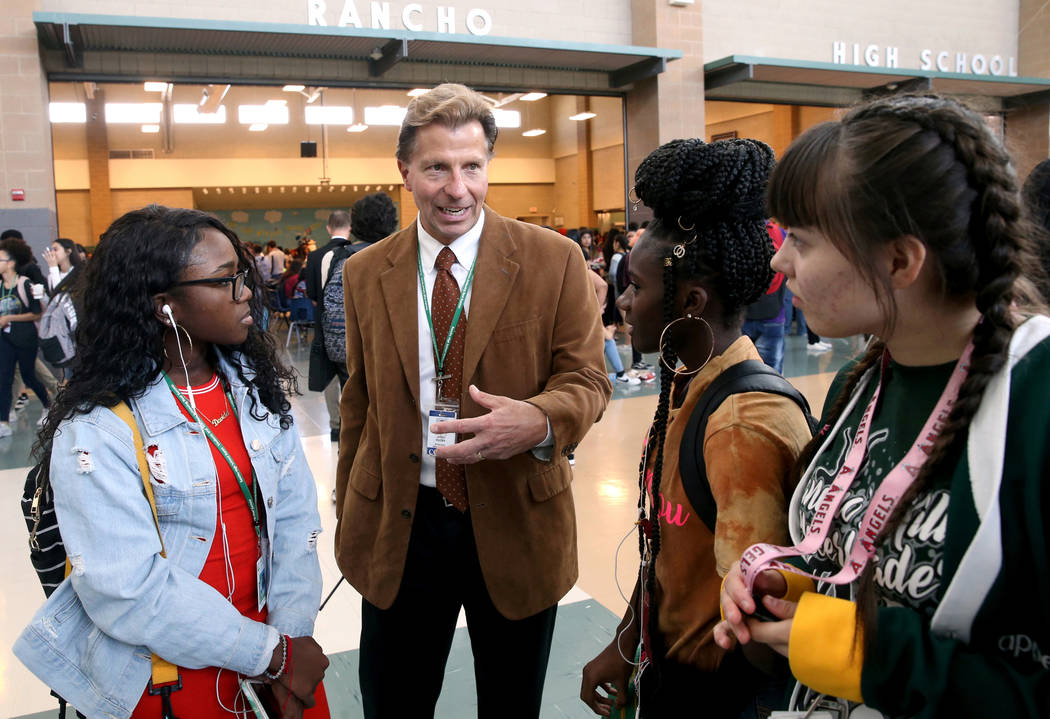 Principal James Kuzma visits with Davida Tyson, from left, Jantanazia Robinson and Malia Simons ...