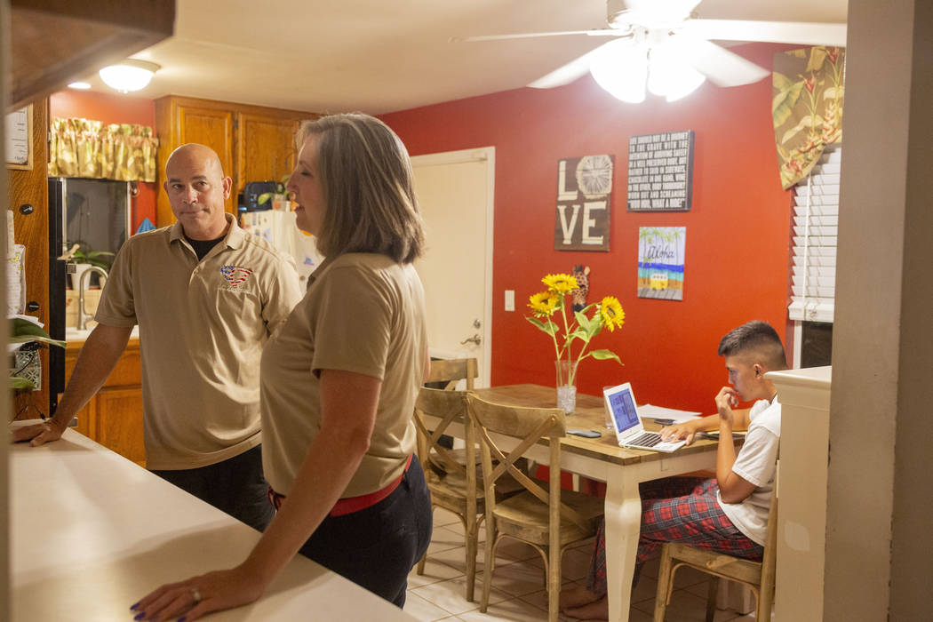 Troy Zeeman, left, Shannon Zeeman, center, and Dean Zeeman, 15, in their Garden Grove, Californ ...