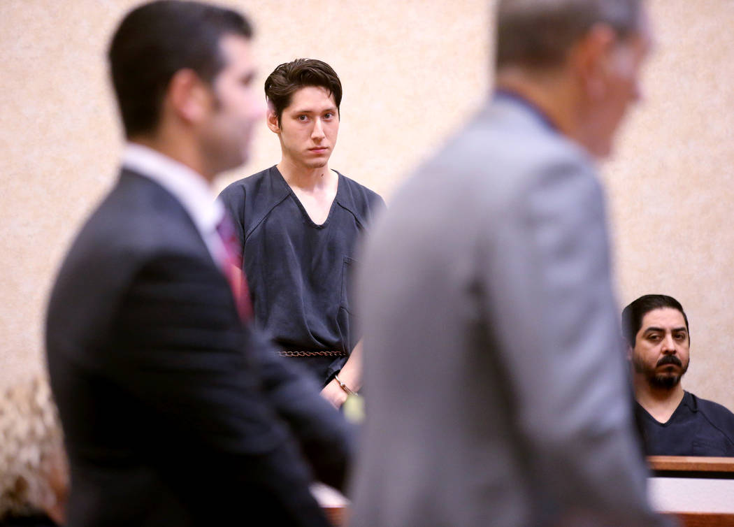 Giovanni Ruiz, 21, second from left, listens as his attorney, Gabriel Grasso, right, and prosec ...