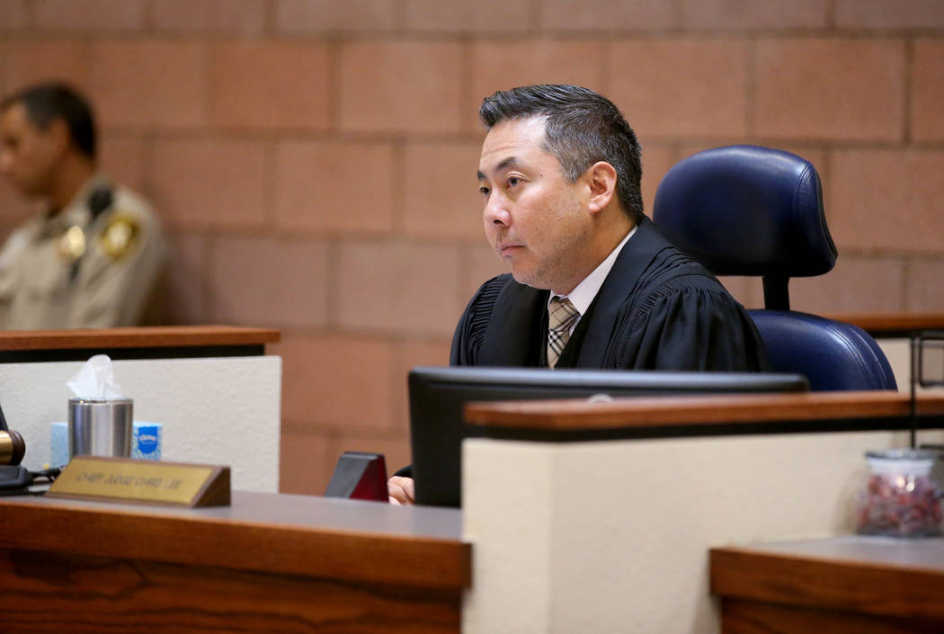 North Las Vegas Justice of the Peace Chris Lee listens to an attorney for Giovanni Ruiz, 21, Tu ...