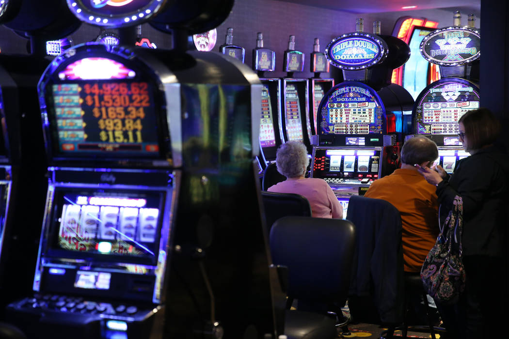 People play the slot machines at the D Las Vegas hotel-casino in Las Vegas, Friday, Aug. 23, 20 ...