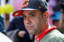 Miguel Perez Jr. listens to a supporter speaking at a news conference in Chicago on Tuesday, Se ...