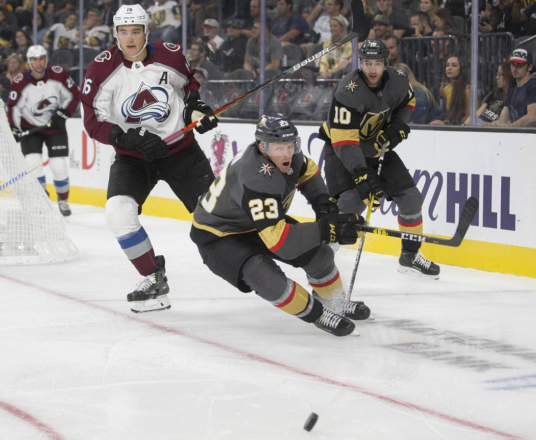 Vegas Golden Knights center Patrick Brown (23) and Vegas Golden Knights center Nicolas Roy (10) ...