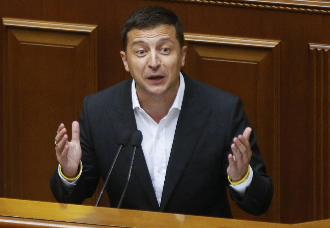 FILE - In this file photo taken on Aug. 29, 2019, Ukrainian President Volodymyr Zelenskiy speak ...