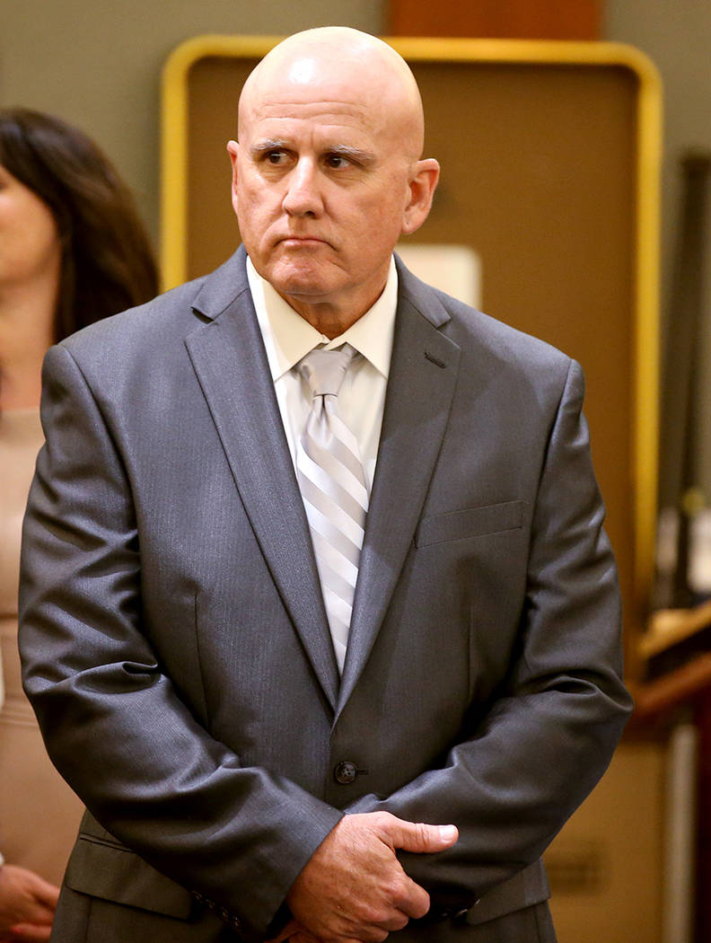 Las Vegas police Lt. James "Tom" Melton stands as the jury walks into the courtroom a ...
