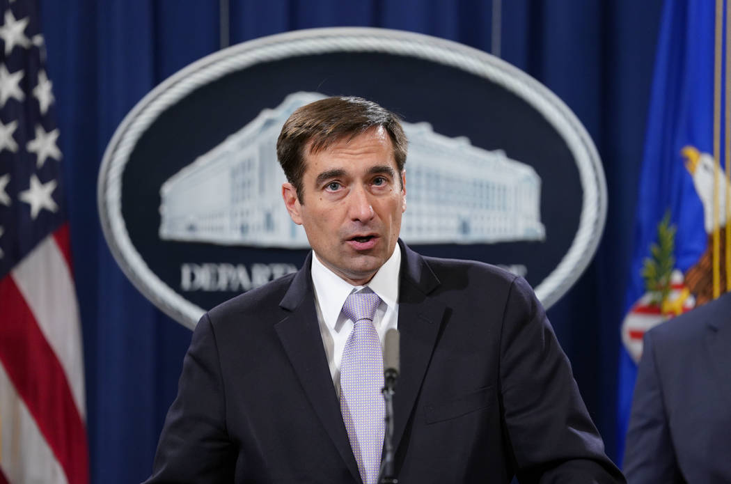 Assistant Attorney General for National Security John C. Demers, speaks during a news conferenc ...