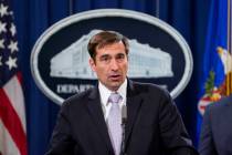 Assistant Attorney General for National Security John C. Demers, speaks during a news conferenc ...