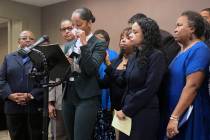 Jazmyne Childs cries during a news conference on Wednesday, Sept. 25, 2019, as she describes th ...