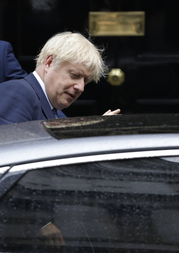 Britain's Prime Minister Boris Johnson leaves 10 Downing Street in London, Thursday, Sept. 26, ...