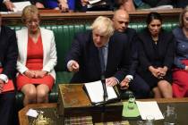 In this handout photo provided by the House of Commons, Britain's Prime Minister Boris Johnson ...