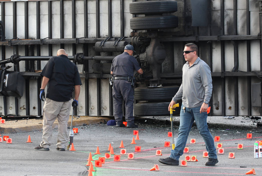 Las Vegas police investigate fatal crash involving two cars and a box truck at East Tropicana A ...