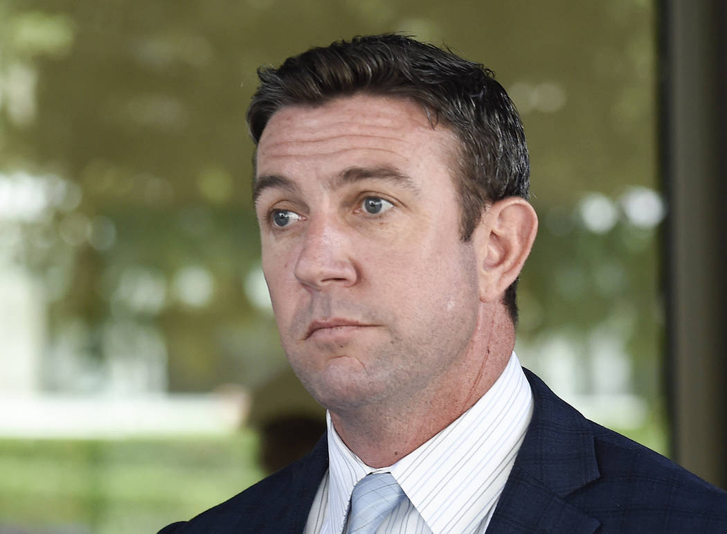 FILE - In this July 1, 2019 file photo U.S. Rep. Duncan Hunter leaves federal court after a mot ...