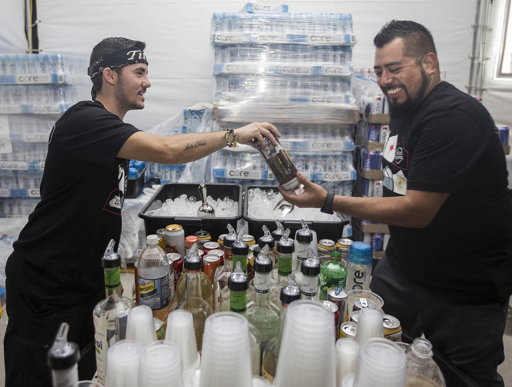 Luca Iclodean, left, makes drinks with Tino Alvarado at Life is Beautiful on Friday, Sept. 20, ...