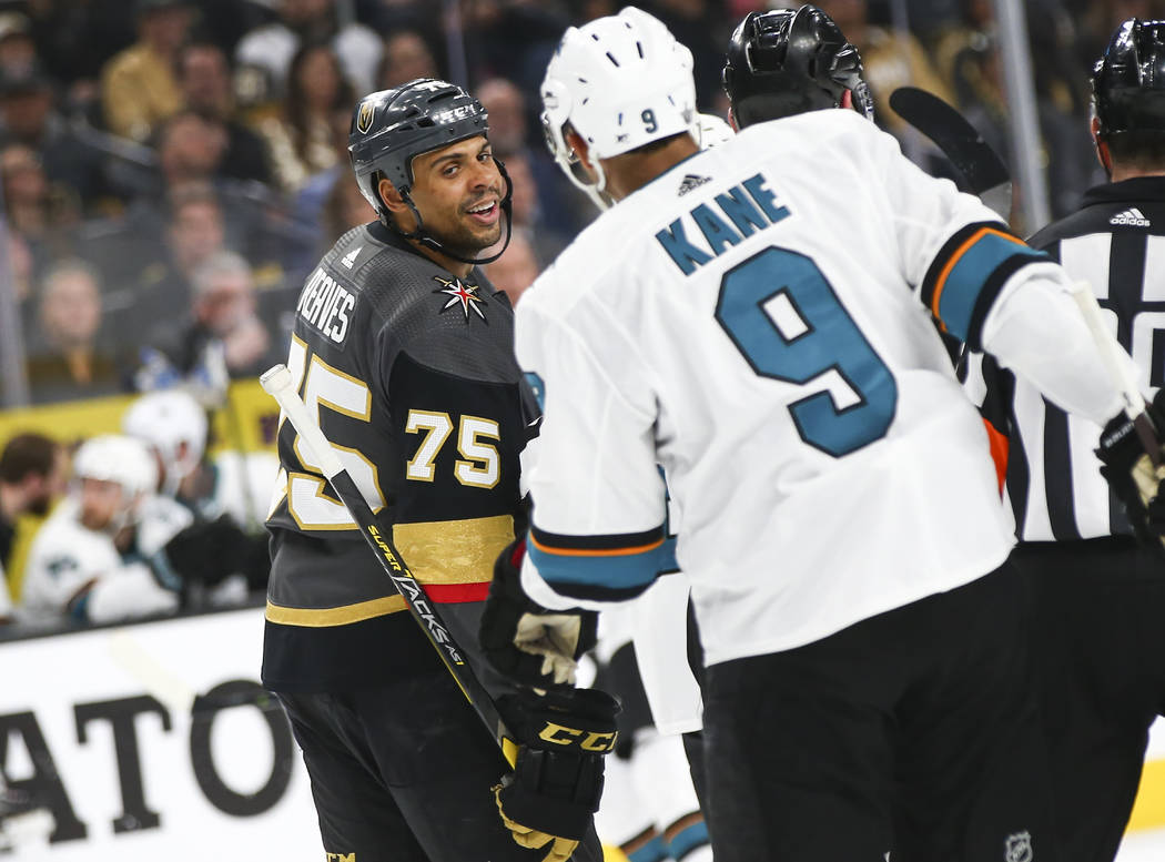 Golden Knights right wing Ryan Reaves (75) exchanges words with San Jose Sharks left wing Evand ...