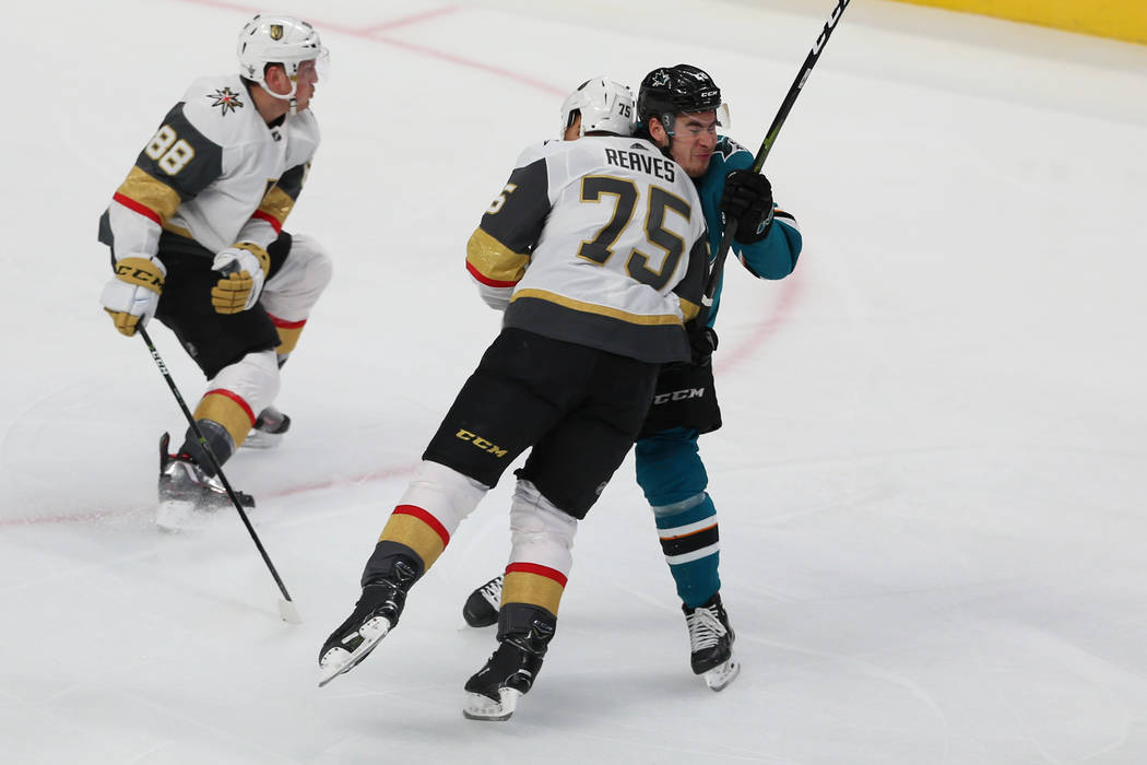 Vegas Golden Knights right wing Ryan Reaves (75) takes down San Jose Sharks right wing Timo Mei ...