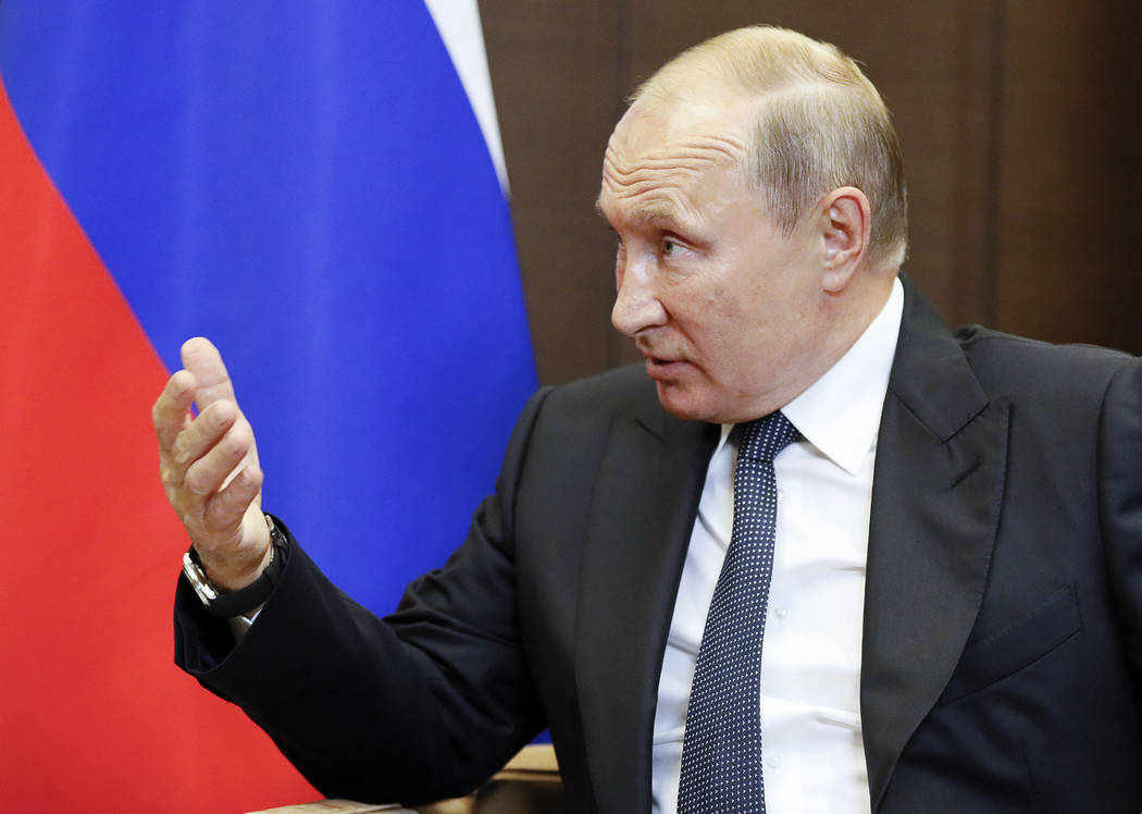 Russian President Vladimir Putin speaks during his meeting with Israeli Prime Minister Benjamin ...