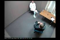 Alek Minassian, top, is seen during a police interview in a still frame taken from handout vide ...
