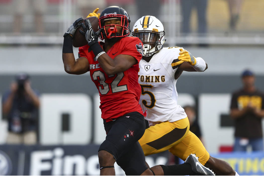 UNLV defensive back Jericho Flowers (32) receives a pass in the end zone to score a touchdown d ...