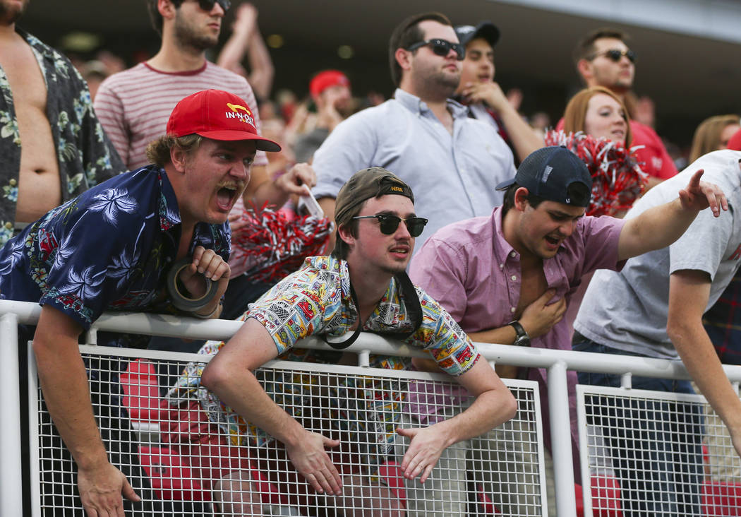 UNLV fans cheer during a football game against Wyoming at Sam Boyd Stadium in Las Vegas on Satu ...