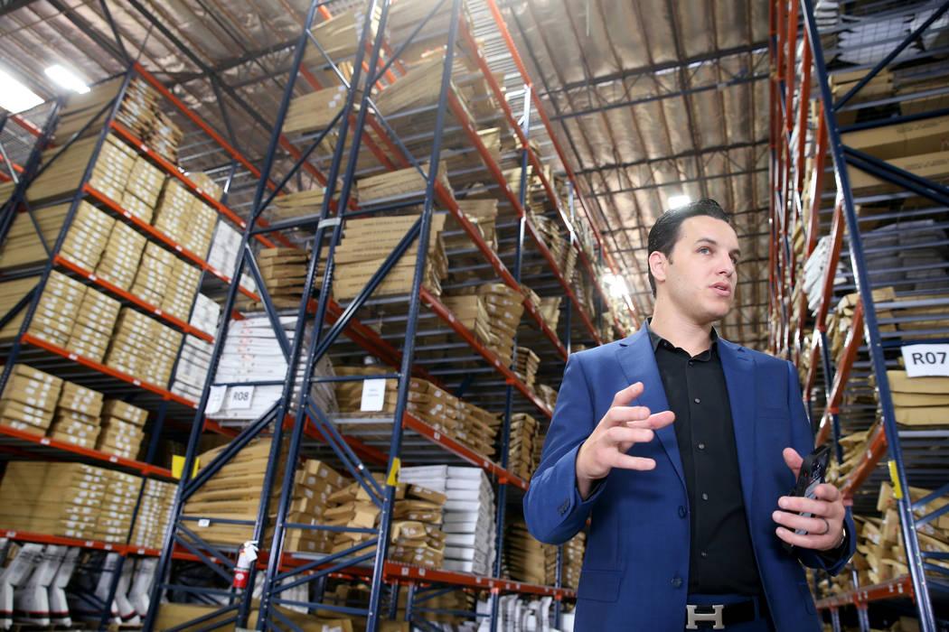 Chief Operating Officer David Meniane gives a tour of the new CarParts.com distribution facilit ...