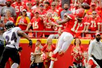 Kansas City Chiefs wide receiver Demarcus Robinson (11) makes a one-handed touchdown catch in f ...