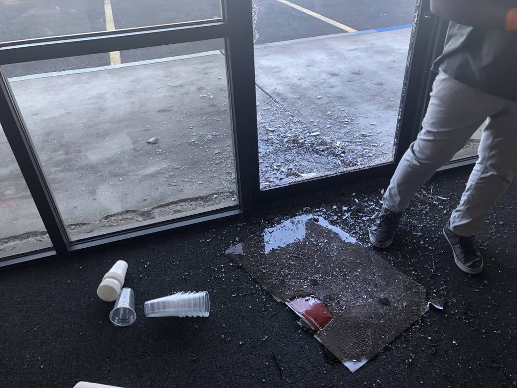 Broken glass at the Clark County Republican Party office on Saturday, Sept. 29, 2019. (Tiffany ...