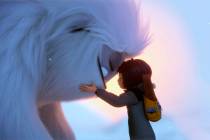 This image released by DreamWorks Animation shows Everest the Yeti, left, and Yi, voiced by Chl ...