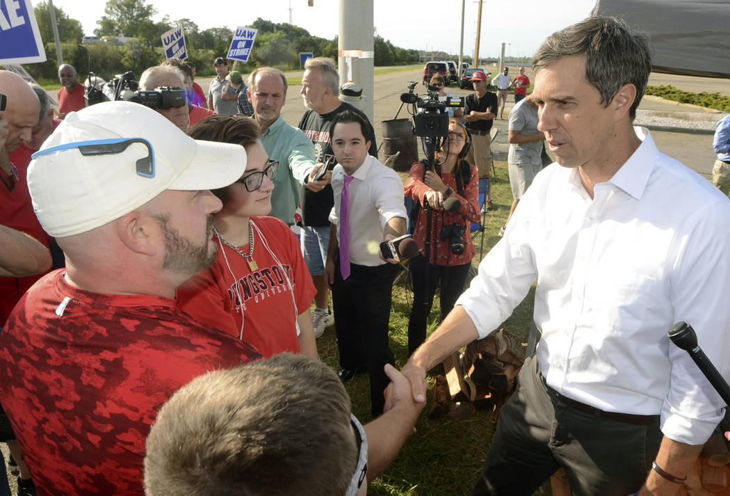 In this Wednesday, Sept. 25, 2019 photo, Democratic presidential candidate Beto O'Rourke, right ...