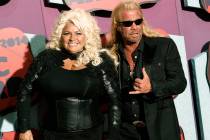 FILE - In this June 4, 2014 file photo, Beth Chapman, left, and Duane Chapman arrive at the CMT ...