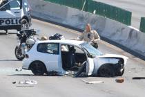 Las Vegas police investigate a crash where two people were critically injured at Desert Inn Roa ...