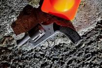 In this photo provided by the New York City Police Department, a hand gun recovered at the scen ...